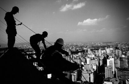 The Big City - Workers work on renovation of the roof of the tallest building in Sao Paulo